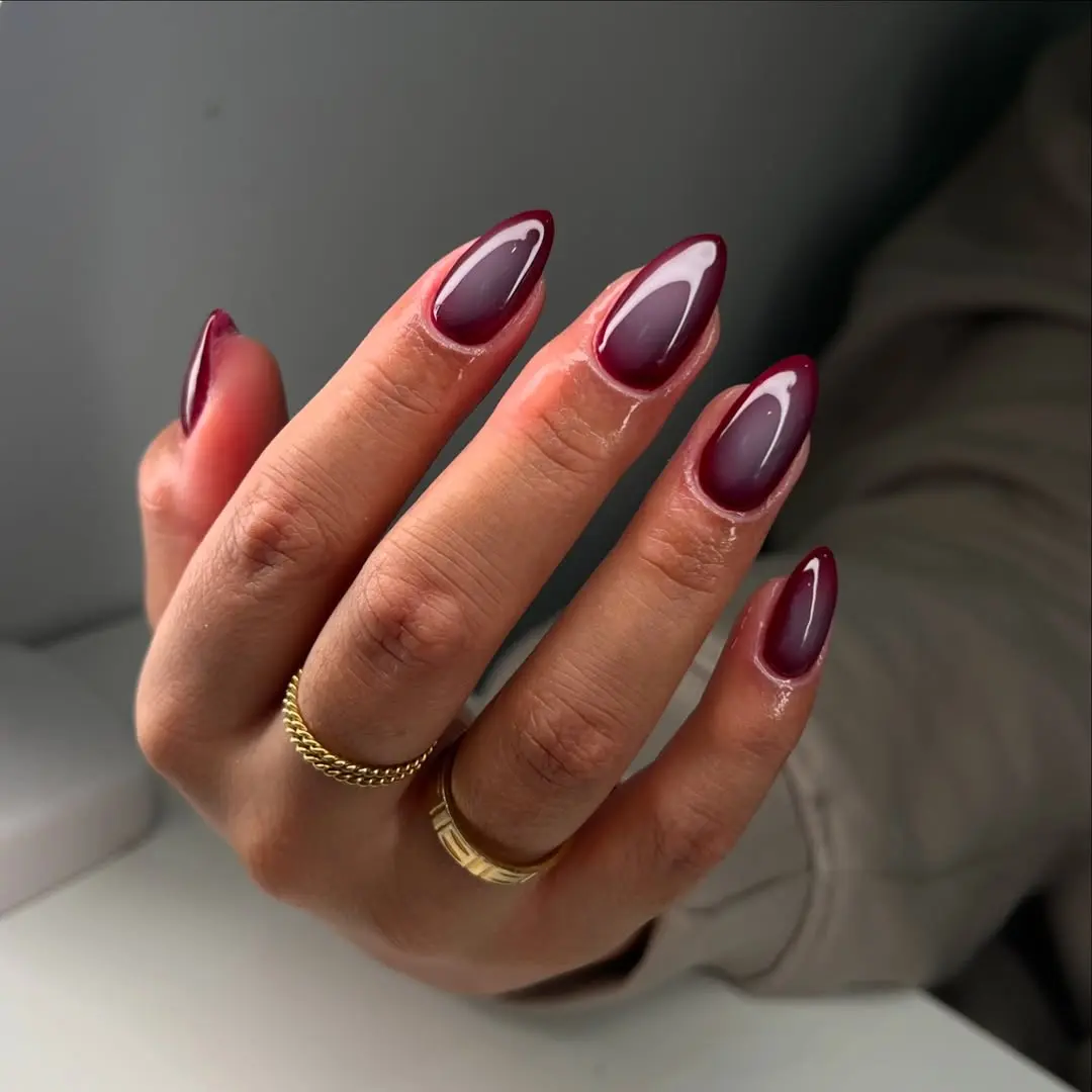 Stunning burgundy stiletto nails with glossy finish
