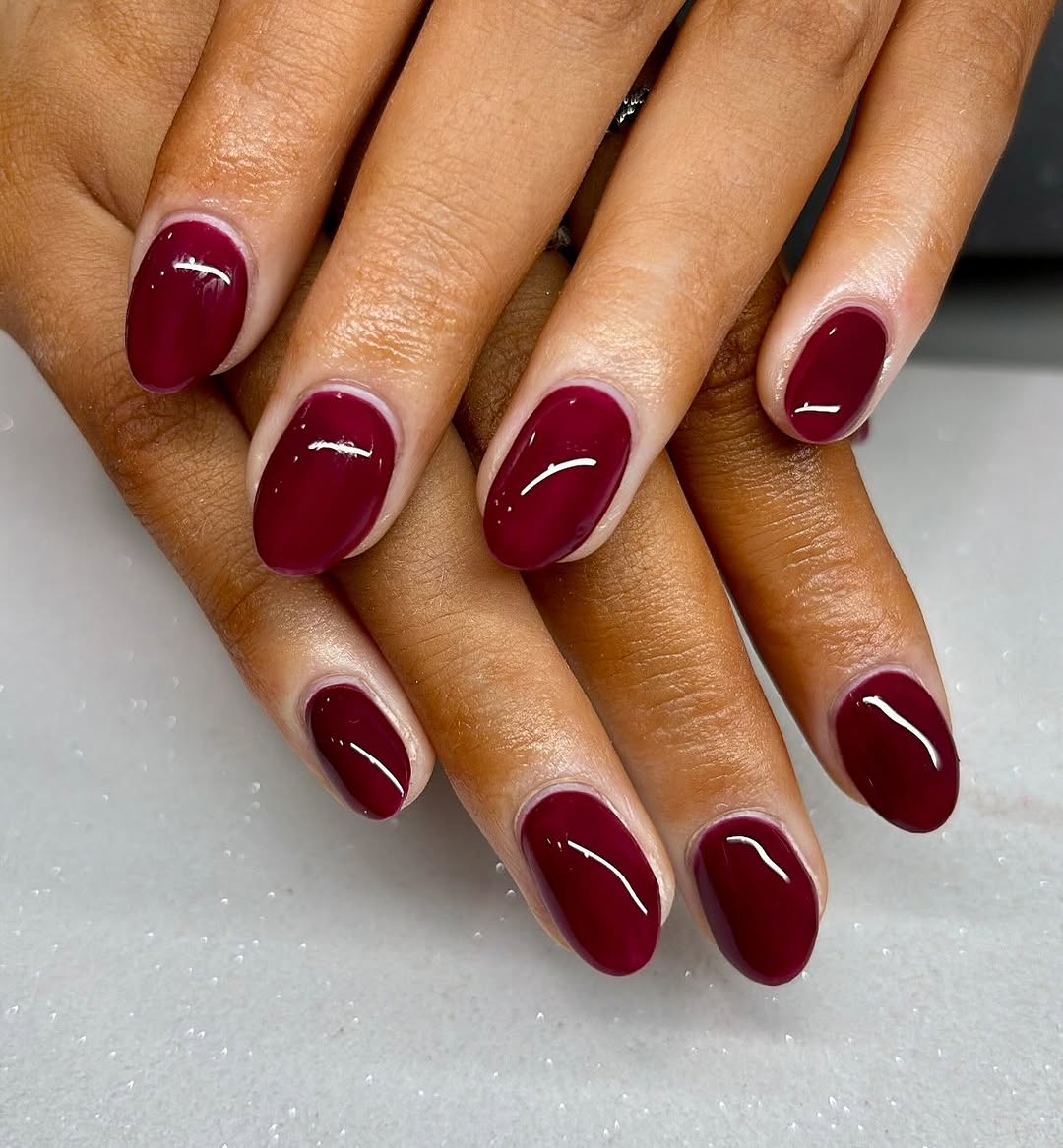 Elegant burgundy nails with a glossy finish