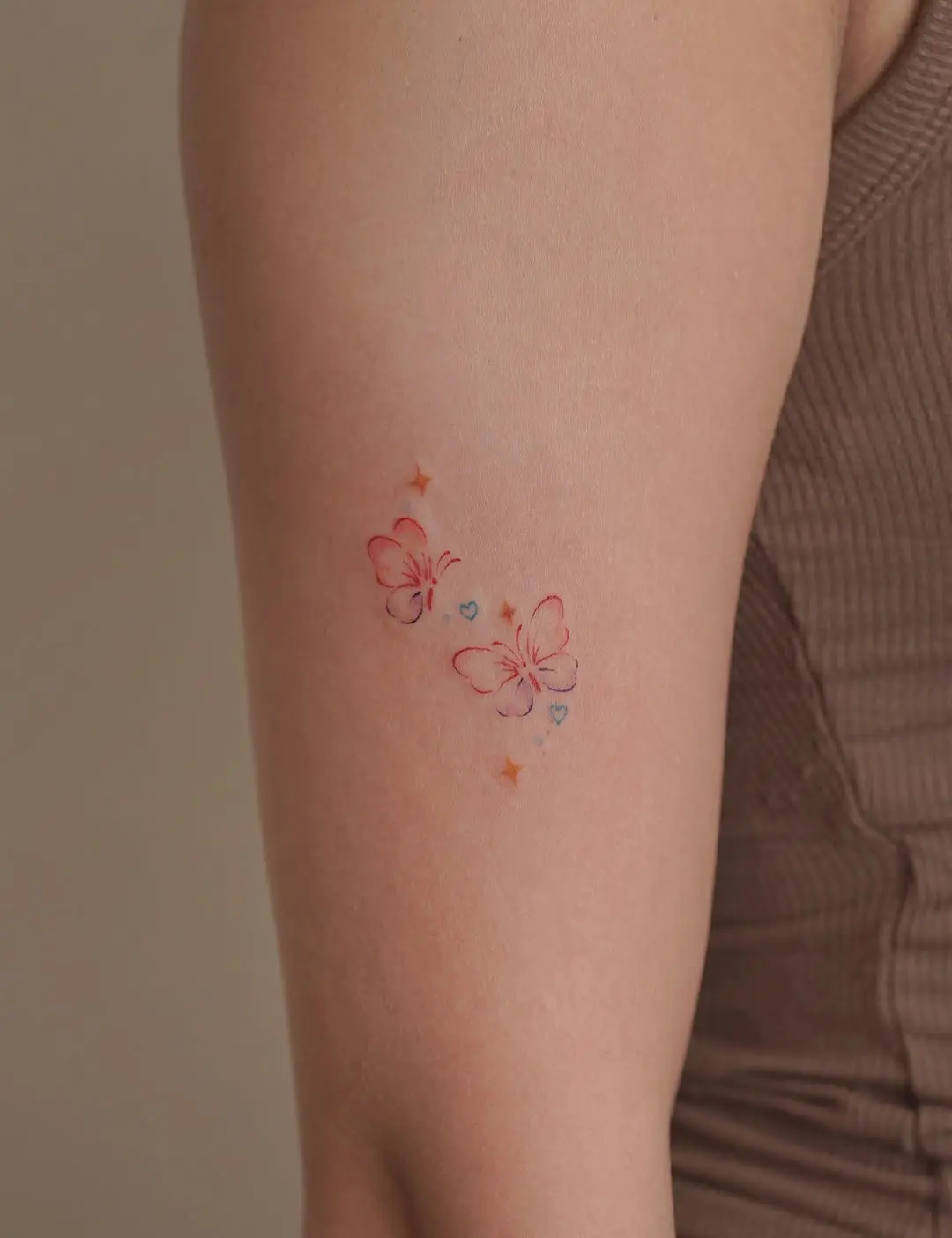 Delicate butterfly tattoos for a minimalist vibe
