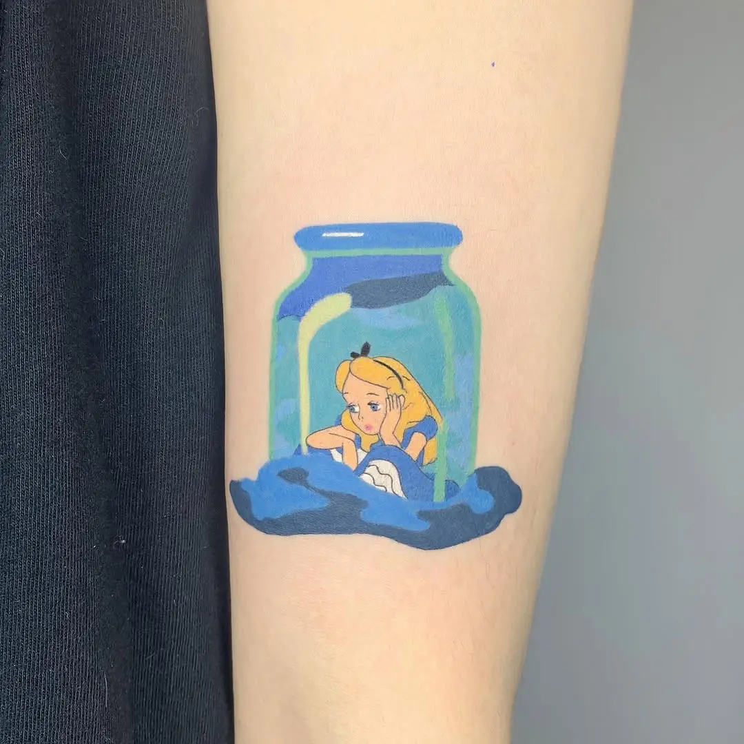 Whimsical Alice in a Glass Jar Tattoo