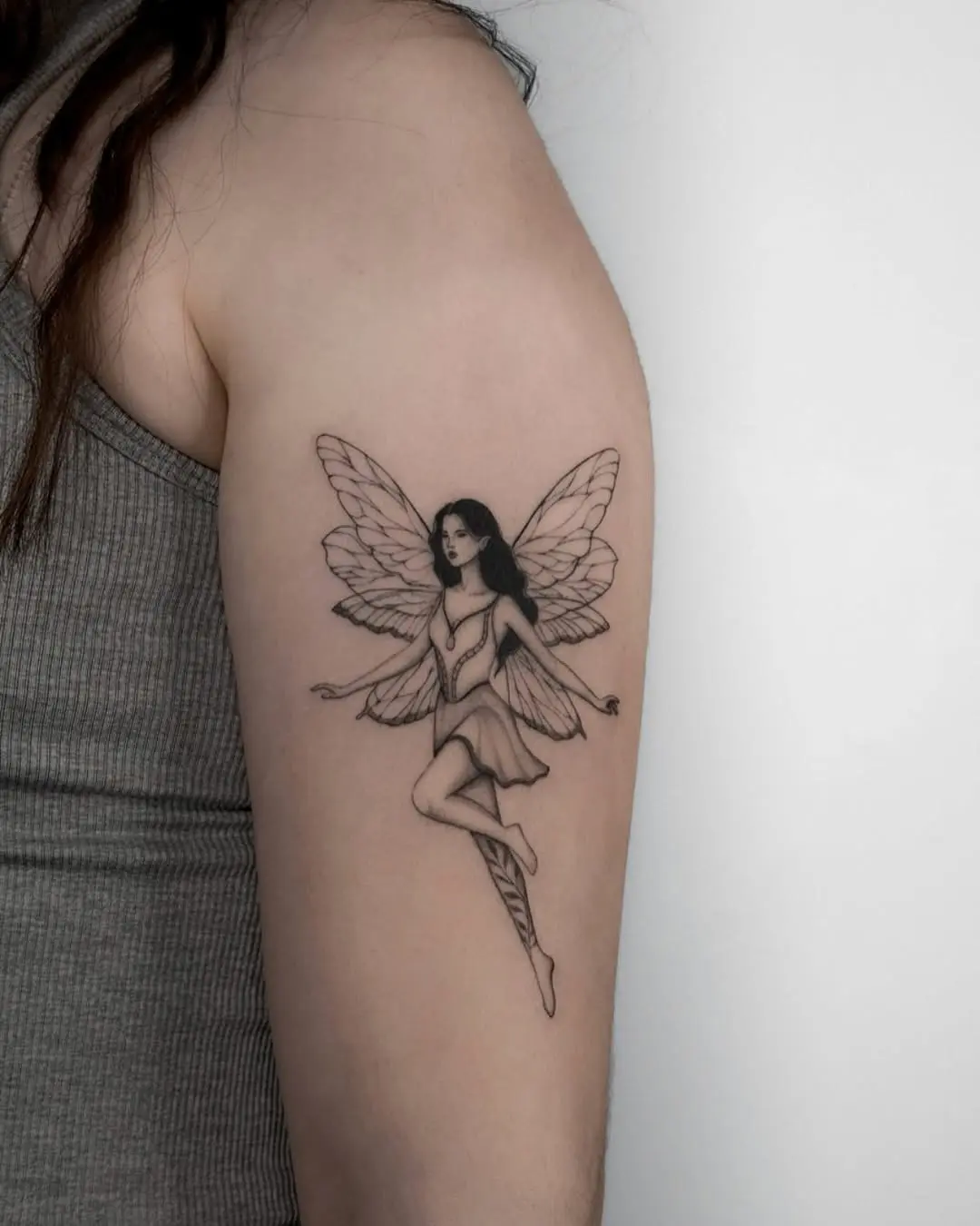 Elegant fairy tattoo with graceful wings