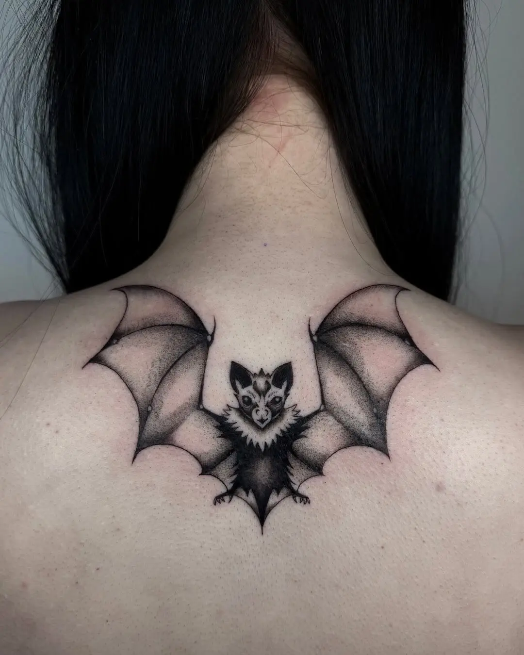 Captivating bat tattoo with intricate details