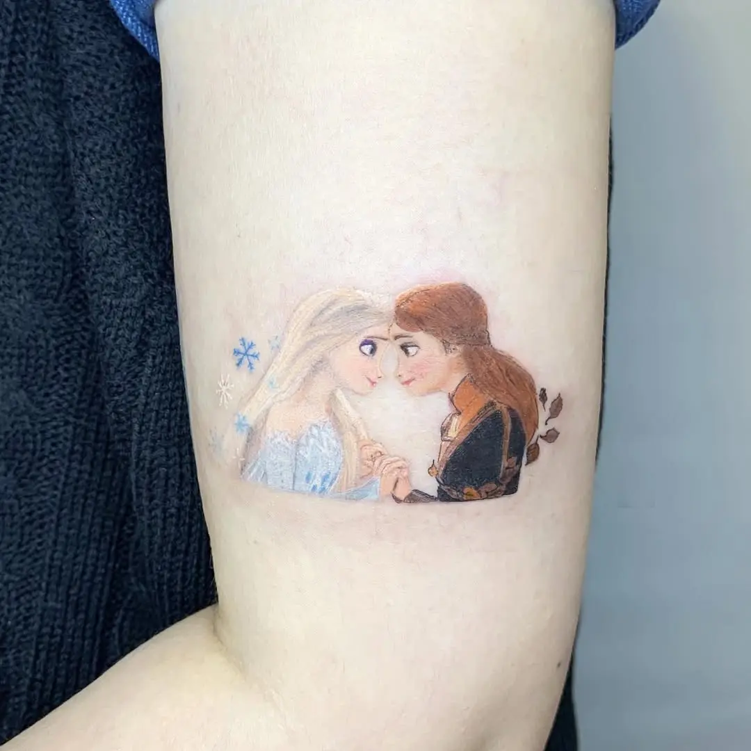 Sisterly love captured in vibrant tattoo art