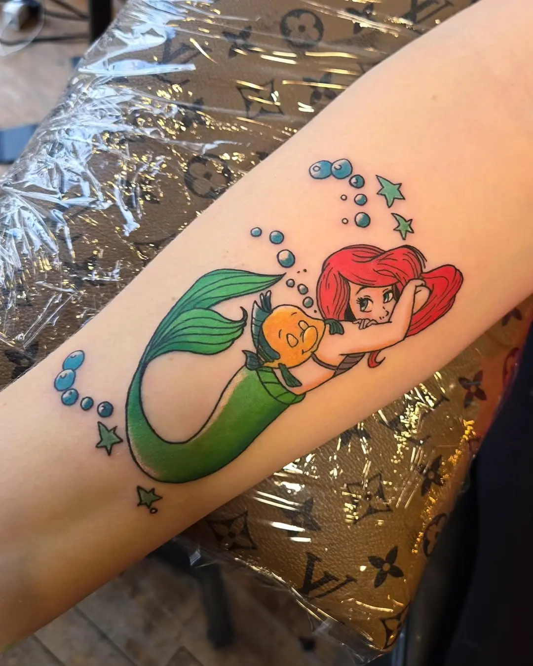 Vibrant Ariel Tattoo with Flounder