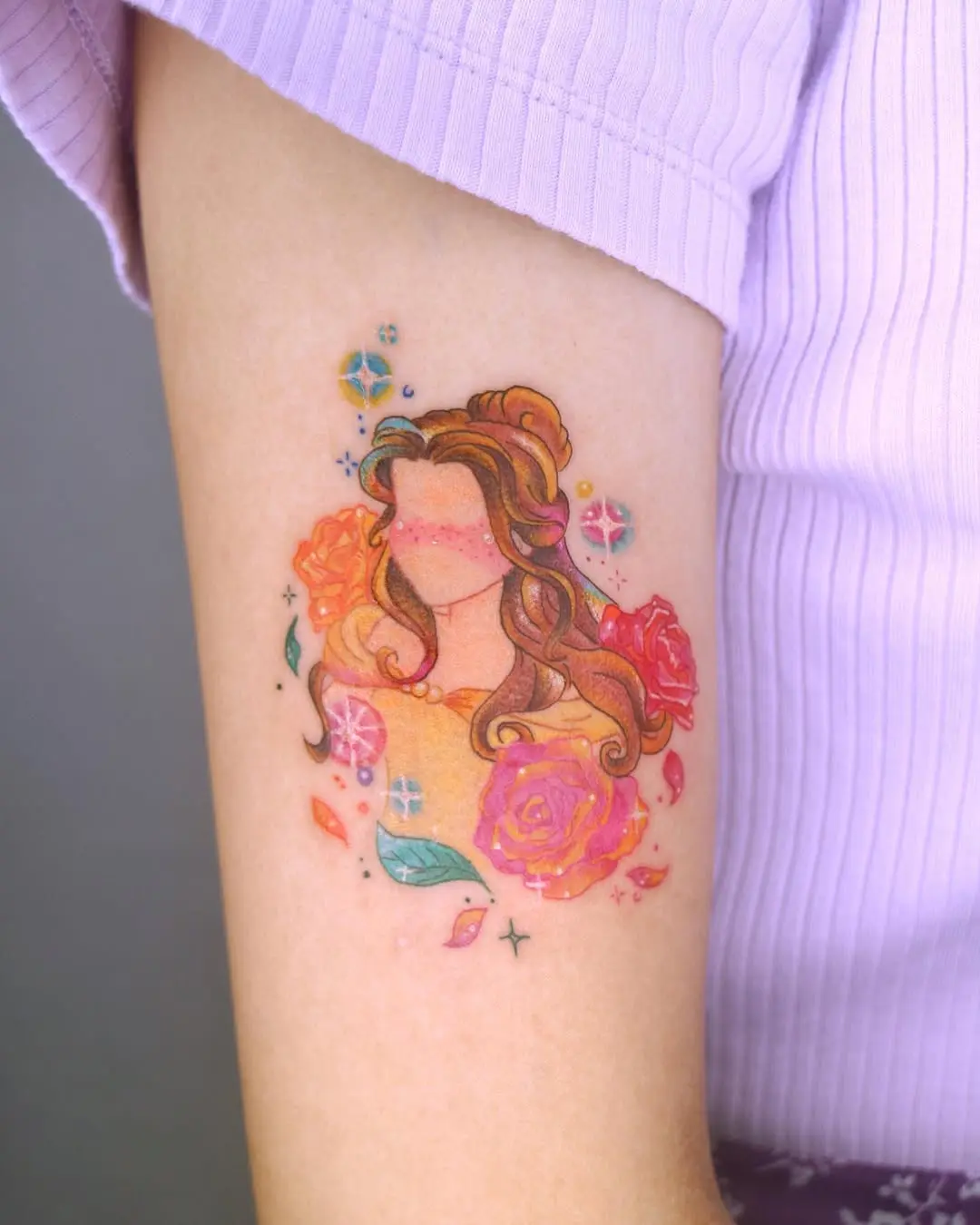 Colorful Belle-themed princess tattoo design
