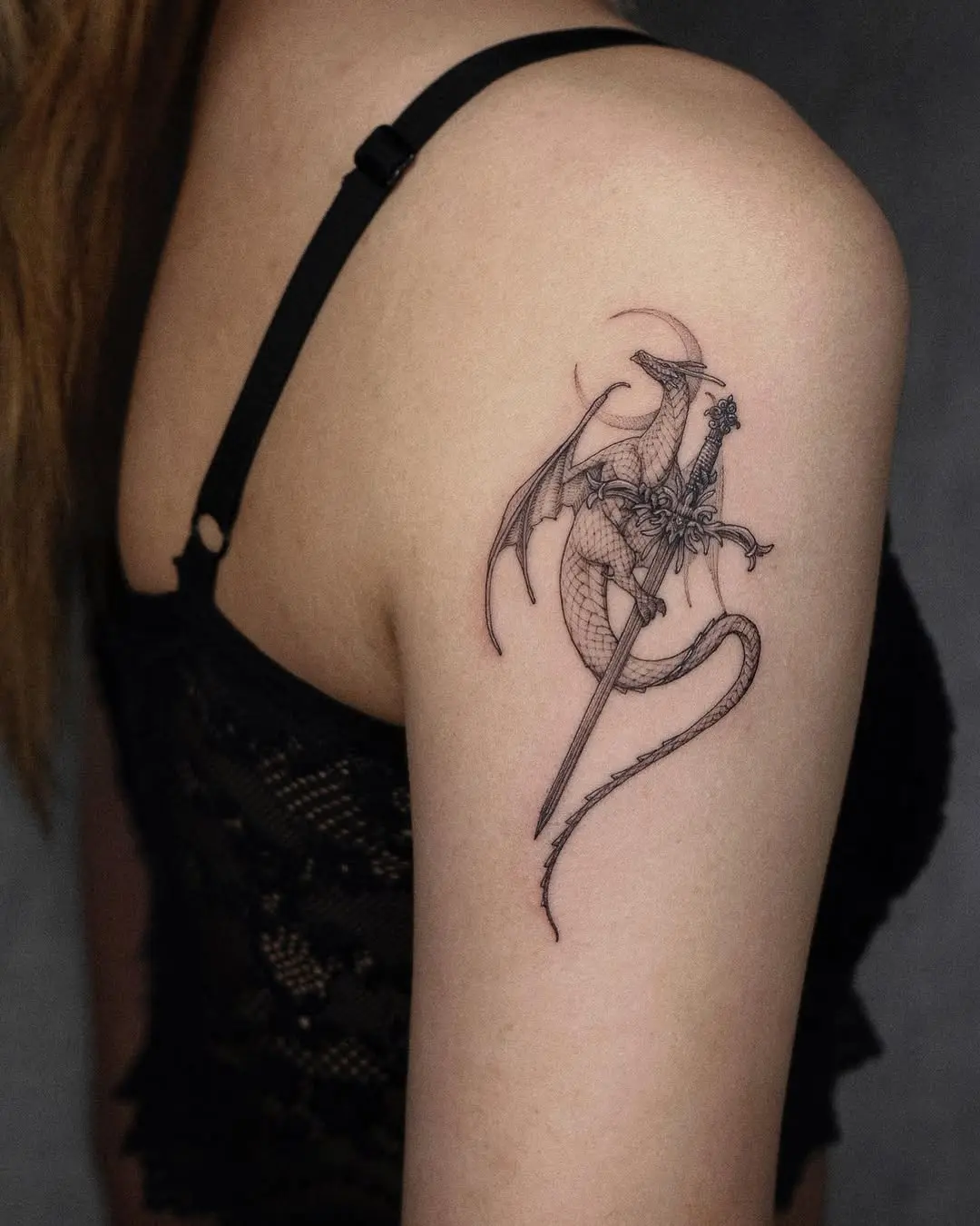 Intricate Sword and Dragon Tattoo Design