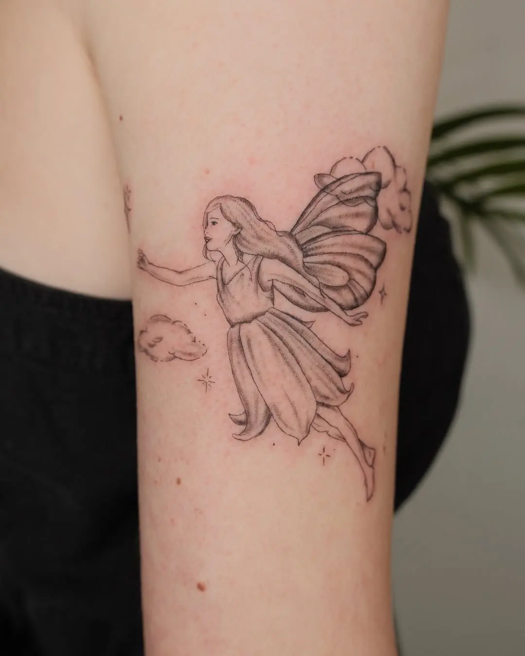 Whimsical Fairy Tattoo on Arm