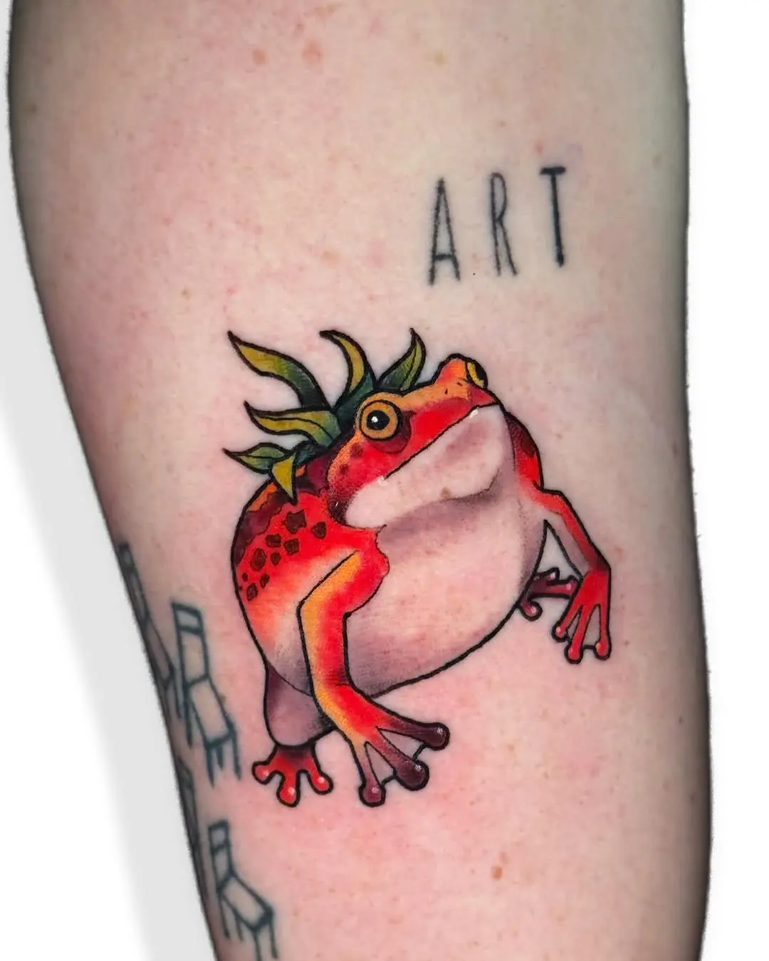 Vibrant Frog Tattoo with Artistic Flair