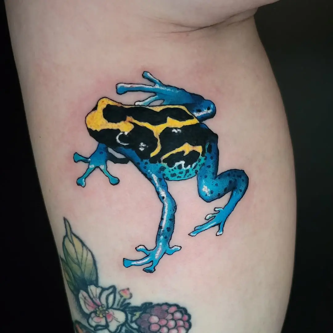 Colorful frog tattoo with intricate detailing