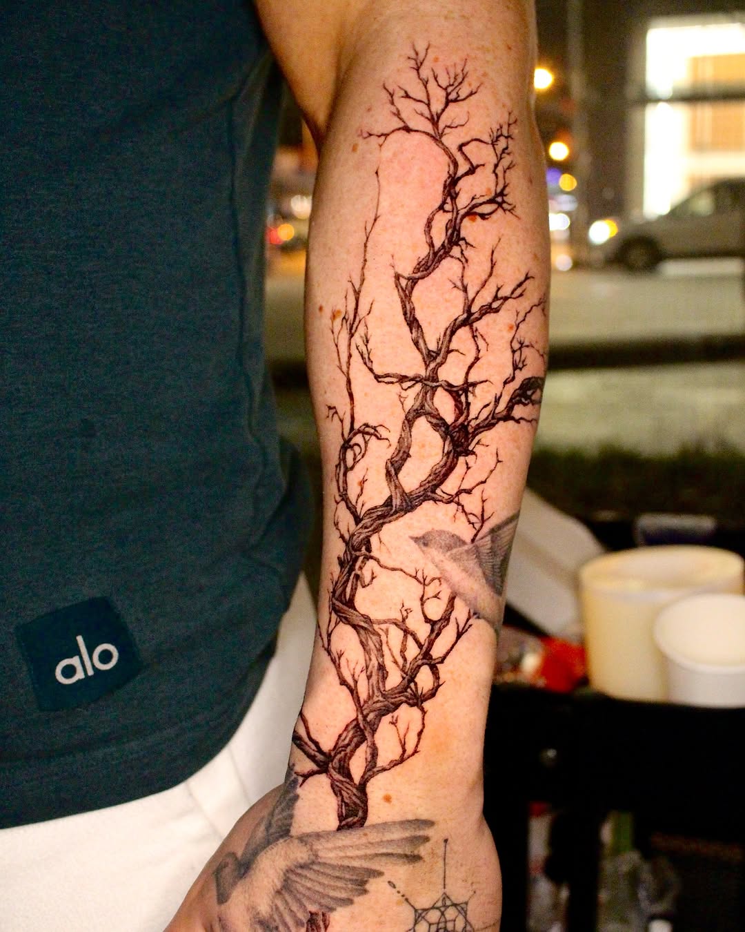 Stunning intricacy of a bare tree tattoo