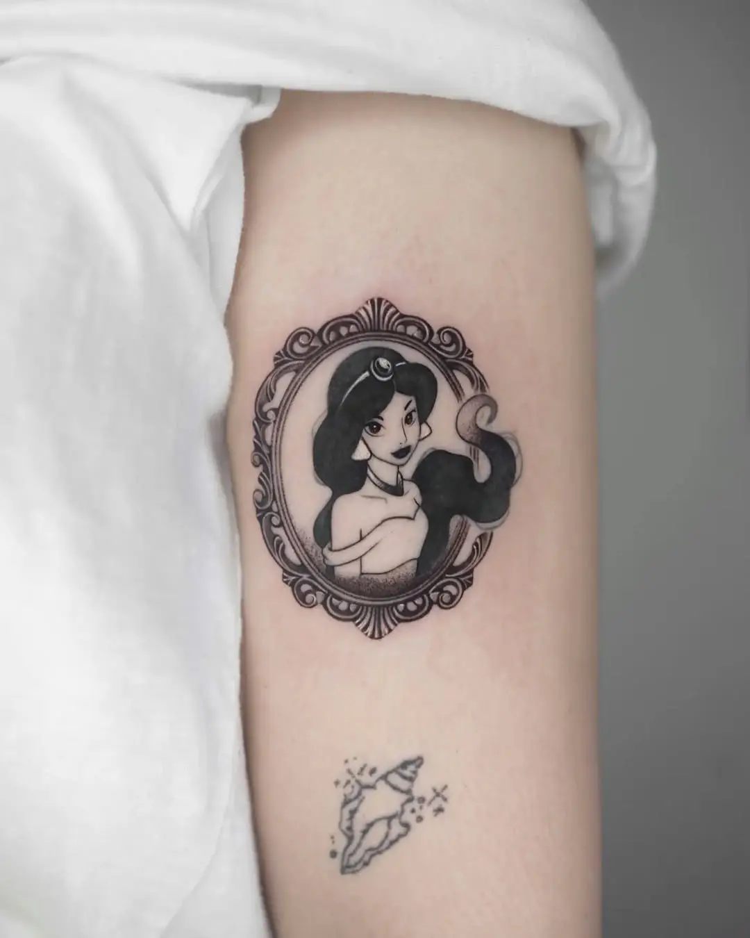 Elegant Jasmine Tattoo in Classic Frame Design