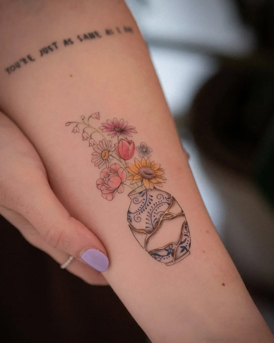 Elegant Kintsugi Flower Vase Tattoo Design