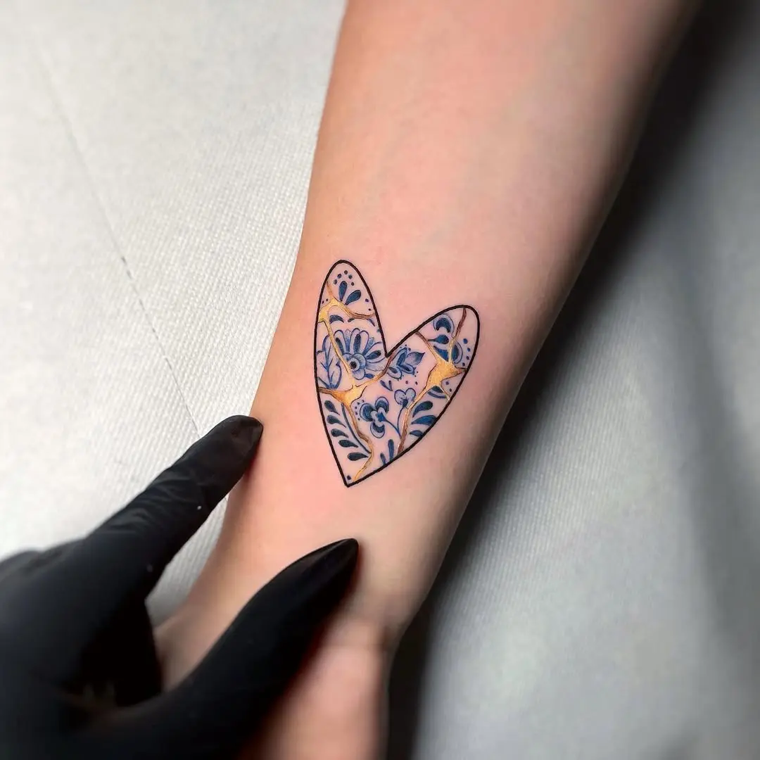 Intricate heart design with kintsugi elements