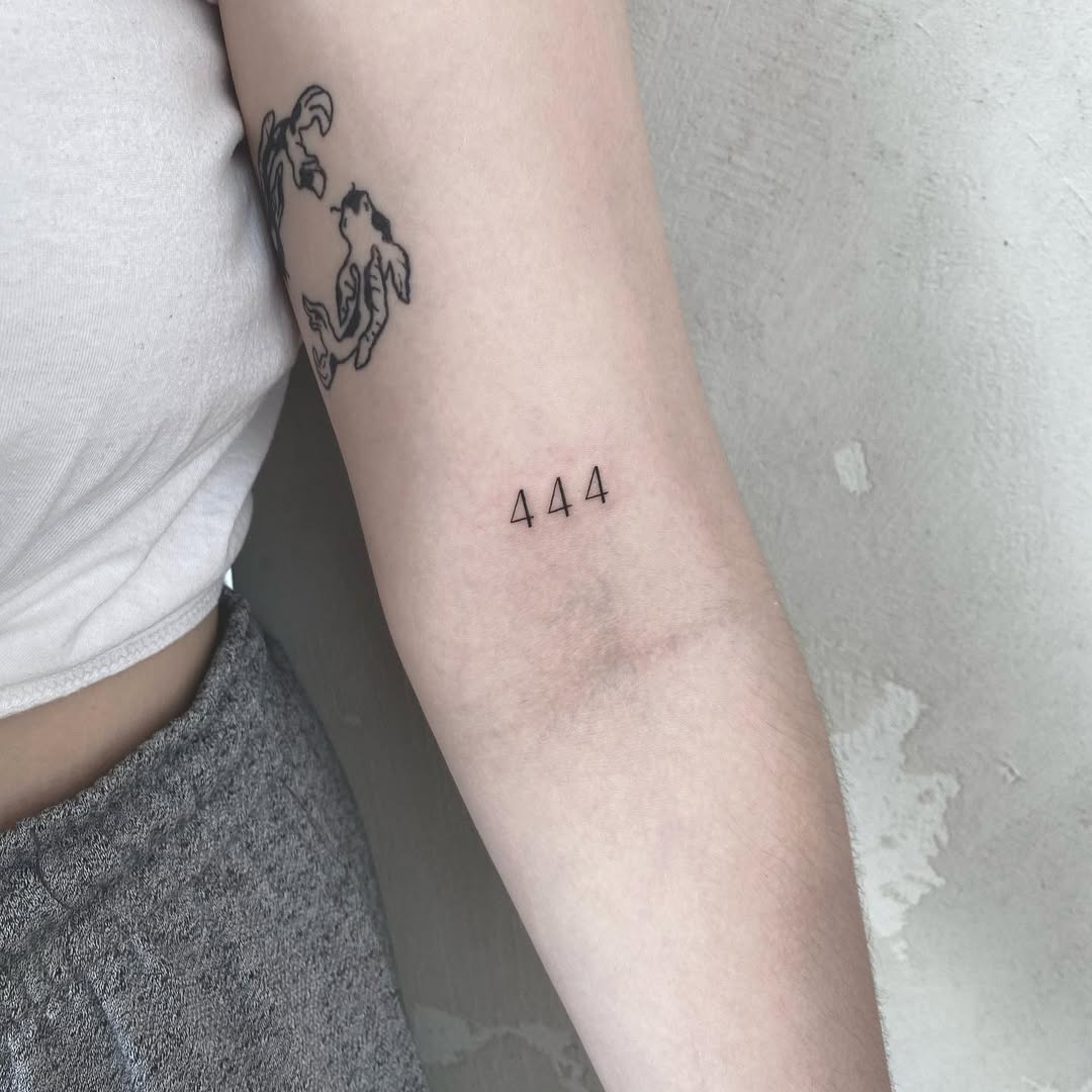 Minimalist 444 Tattoo Design on Inner Arm