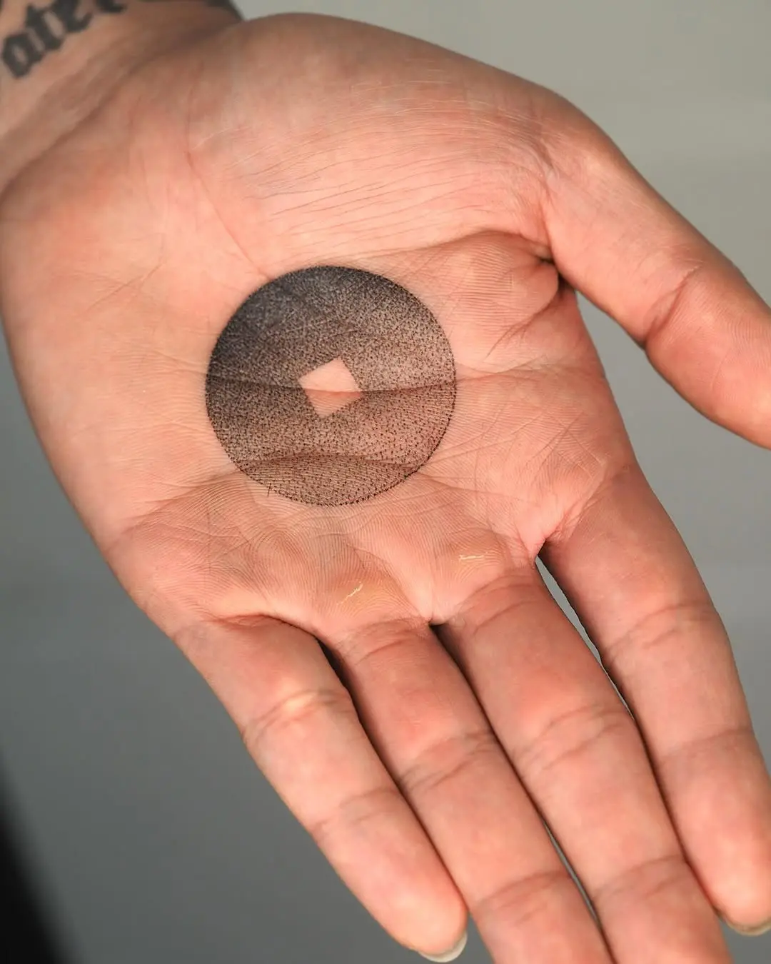 Unique geometric tattoo capturing minimalist essence