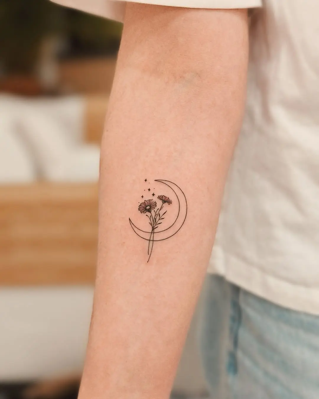 Dreamy moon with floral elegance tattoo