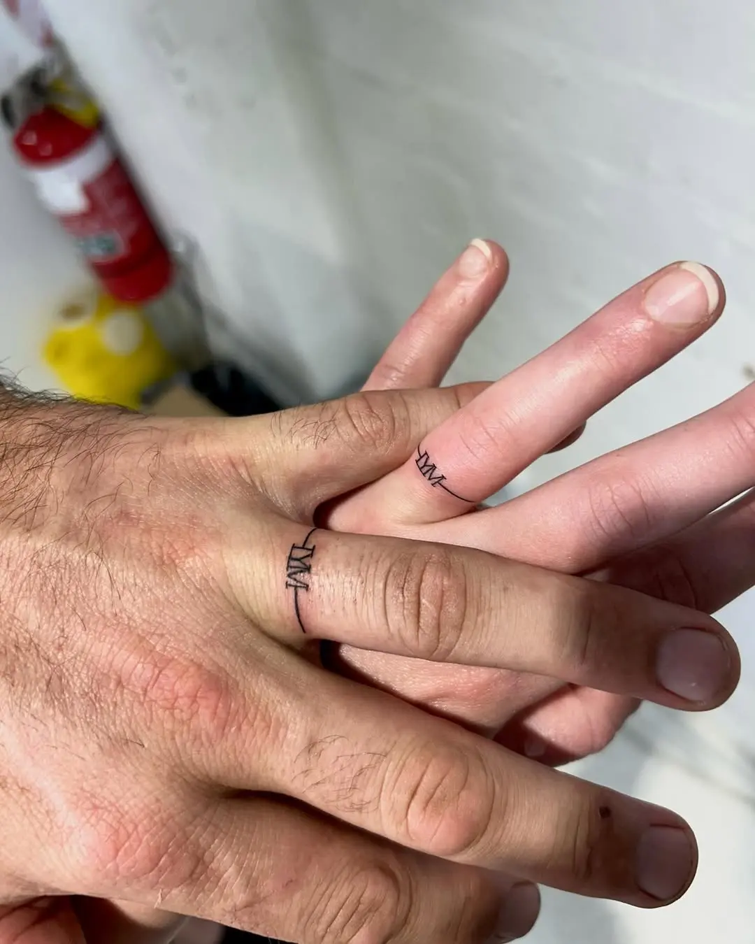 Unique wedding ring tattoos for couples