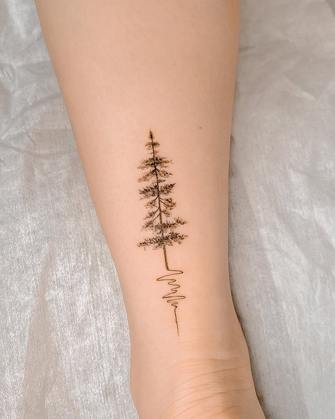 Elegant minimalistic tree tattoo design concept