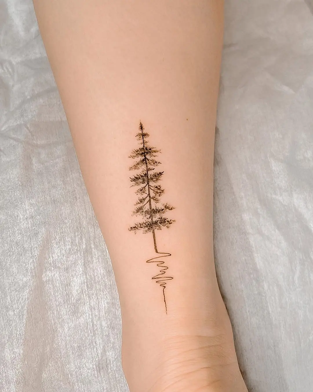 Elegant minimalistic tree tattoo design concept