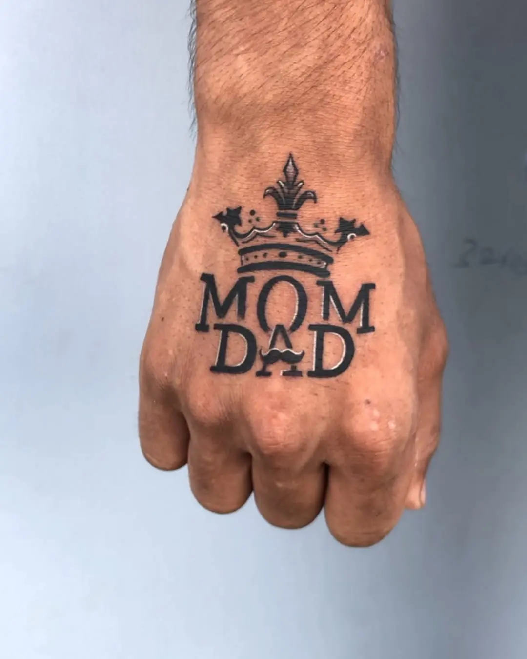 Regal Mom Dad Tattoo with Crown Design