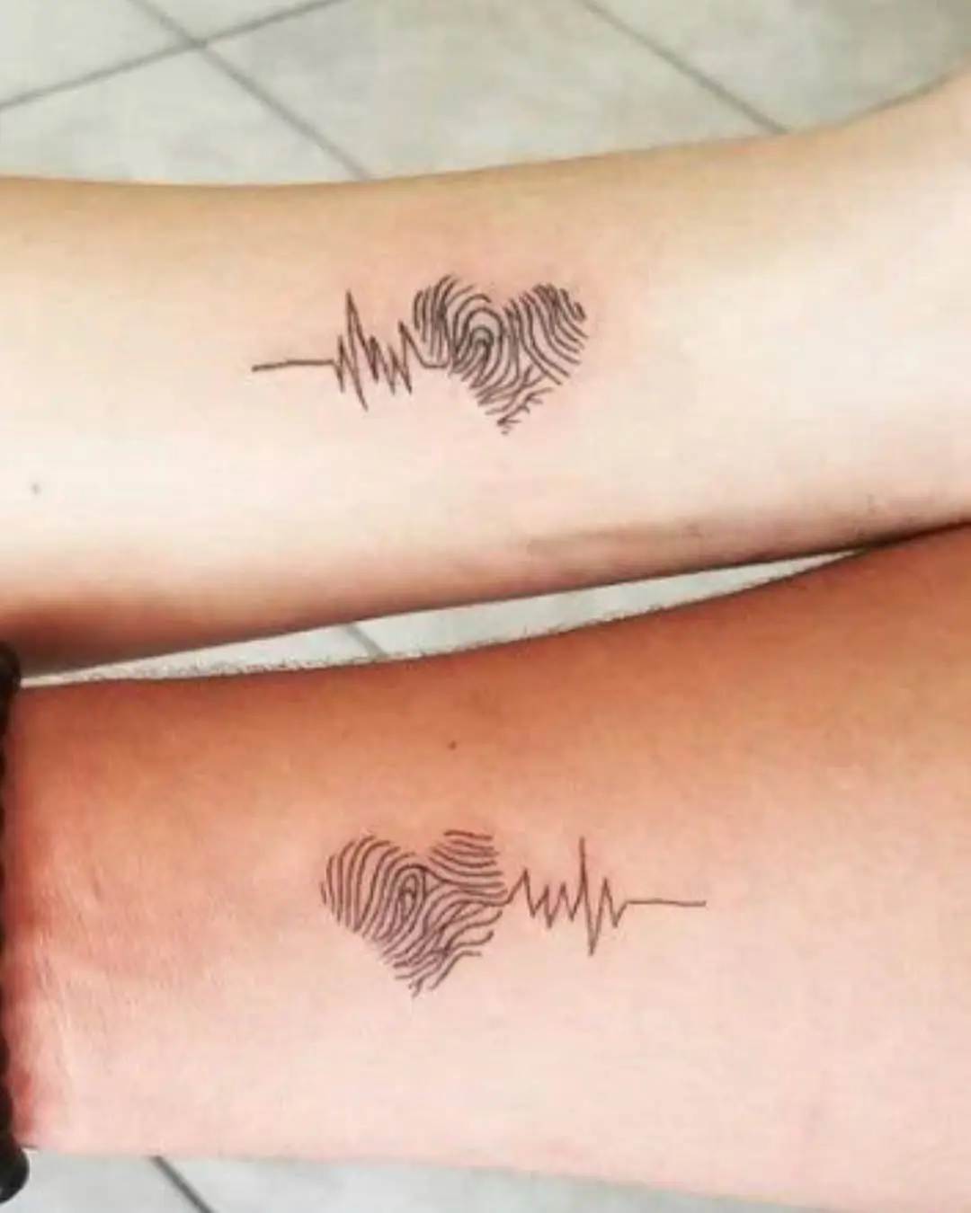 Unique bond captured in heartbeat tattoos