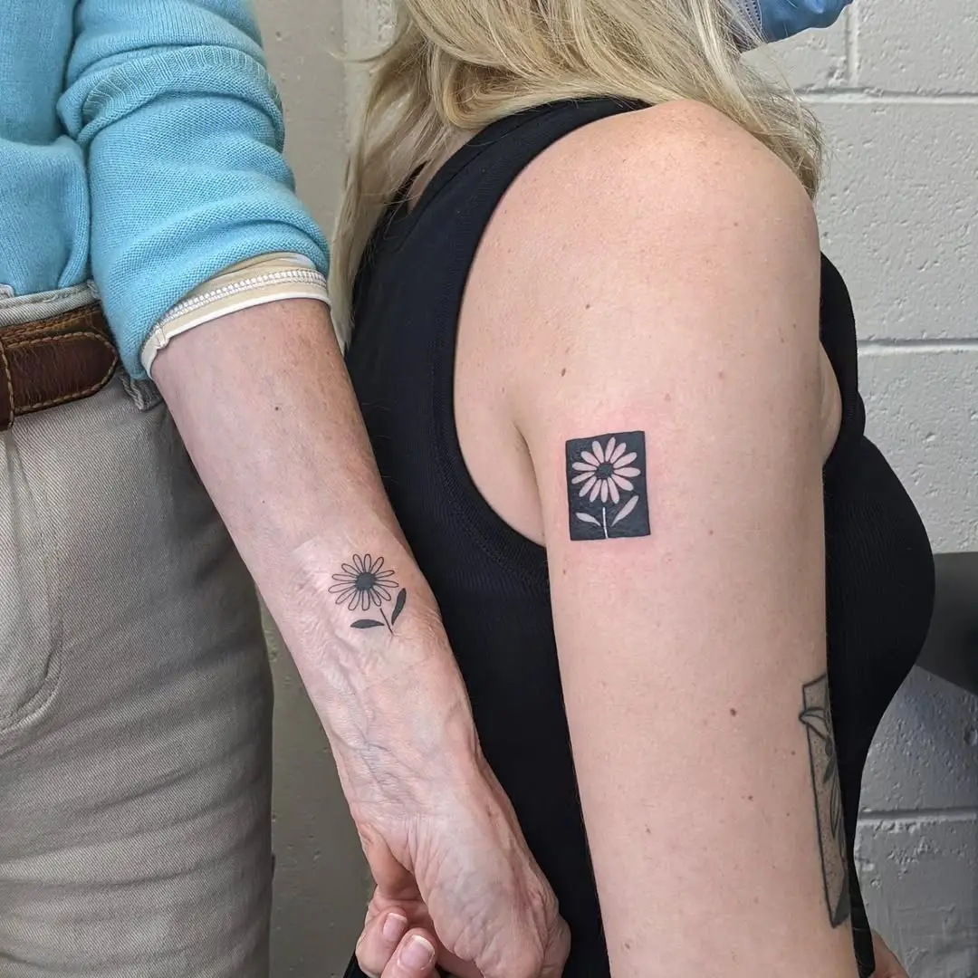 Meaningful floral tattoos celebrating mother-daughter bond