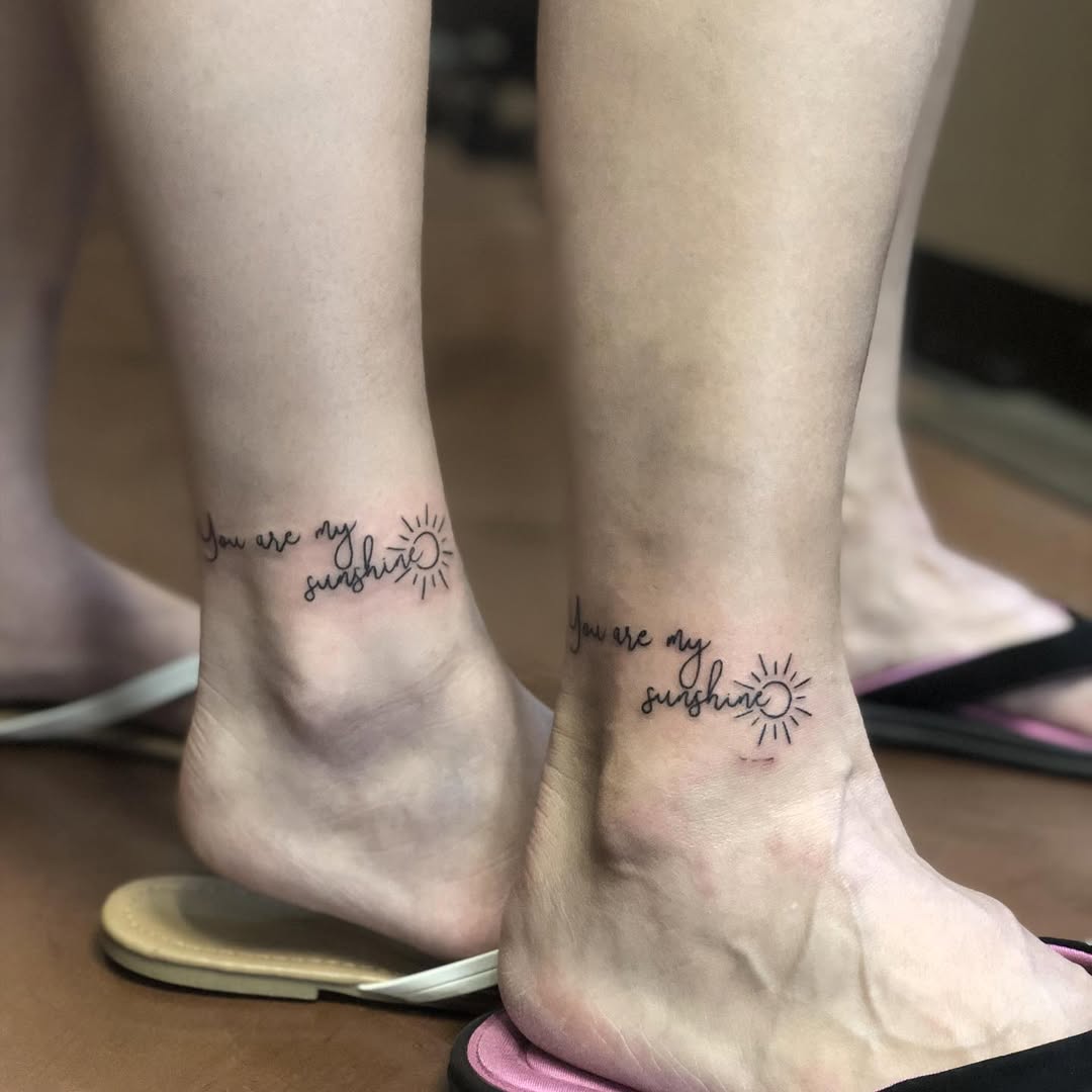 Matching 'You Are My Sunshine' Tattoos