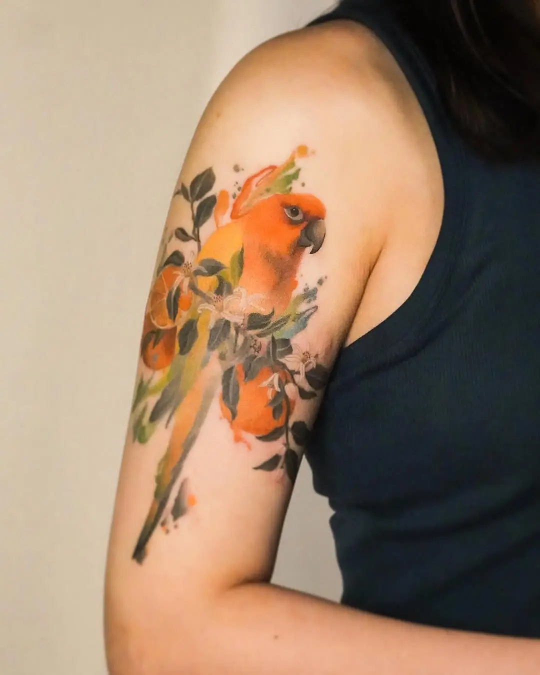 Vibrant Parrot Tattoo Surrounded by Nature