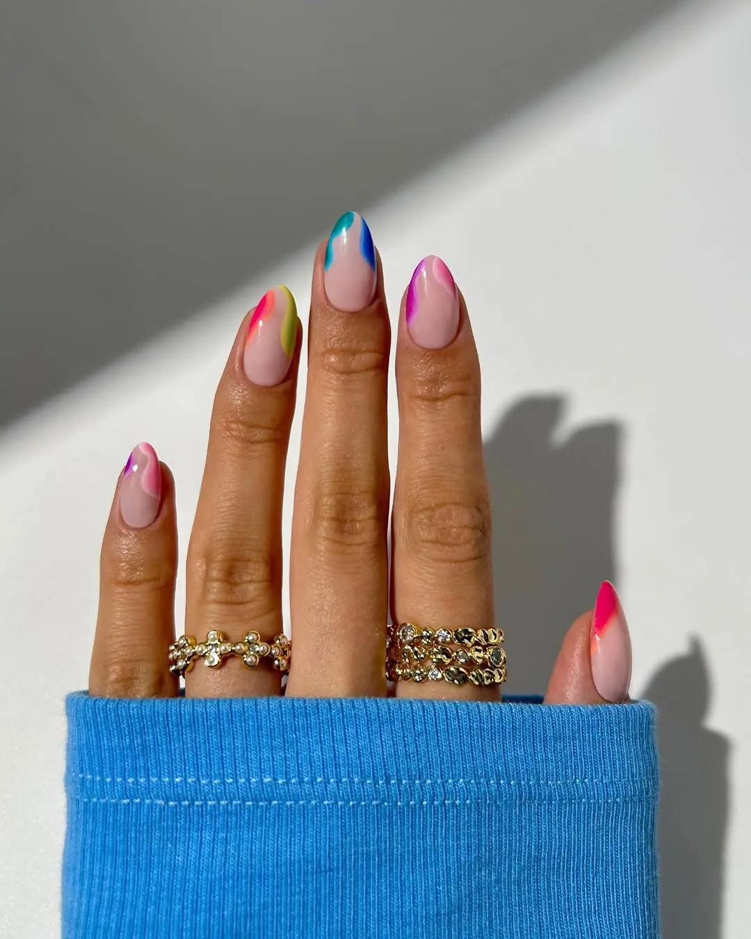 Colorful tips elevate this chic nail design