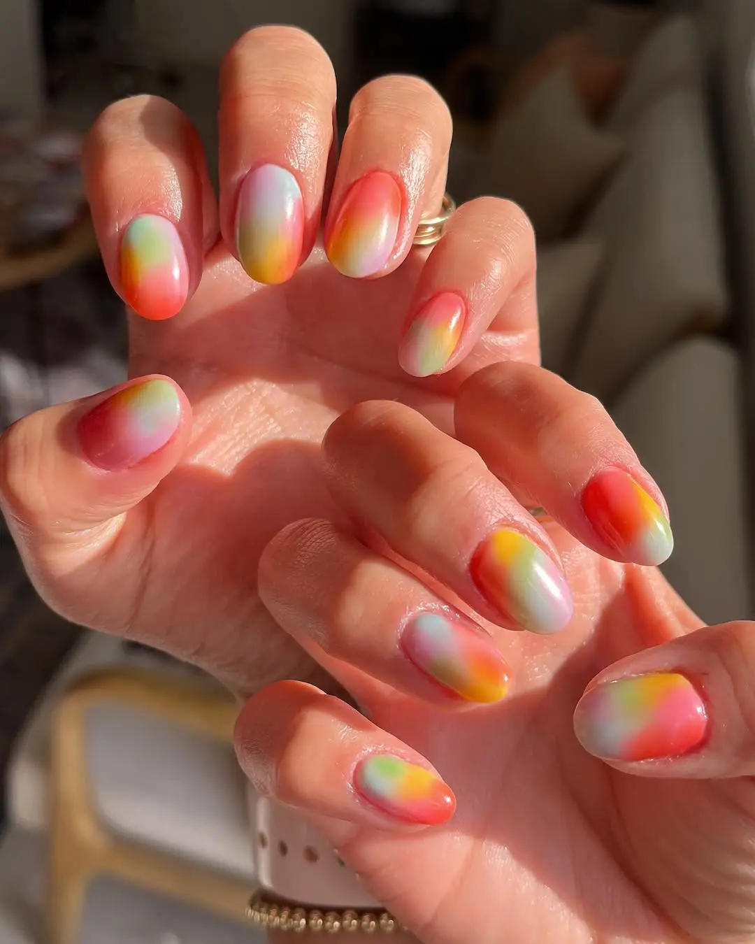 Vibrant rainbow gradient nails for summer vibes