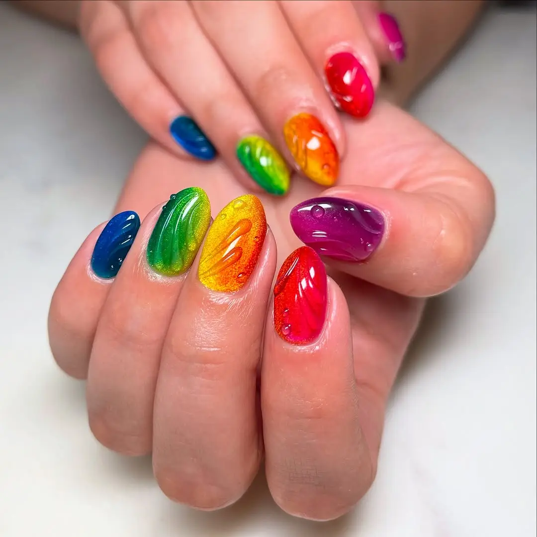 Vivid Rainbow Nails with Artistic Swirls