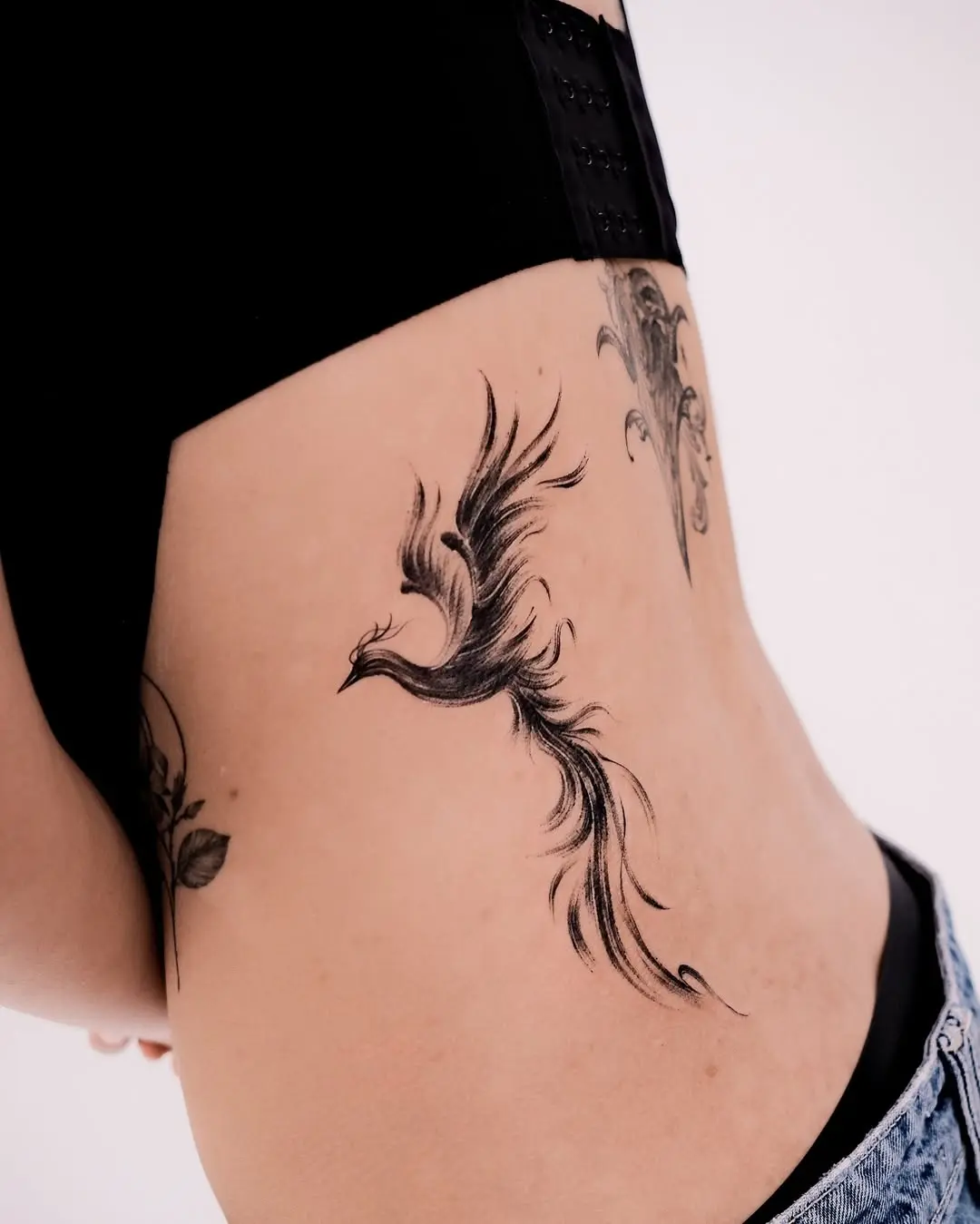Elegant Phoenix Tattoo Signifying Rebirth