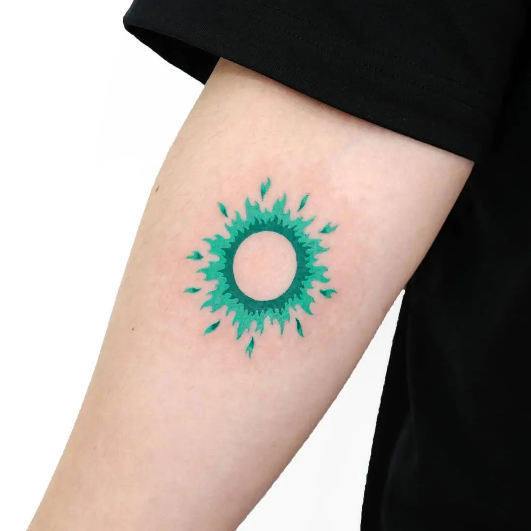 Vibrant sunburst tattoo symbolizing rebirth