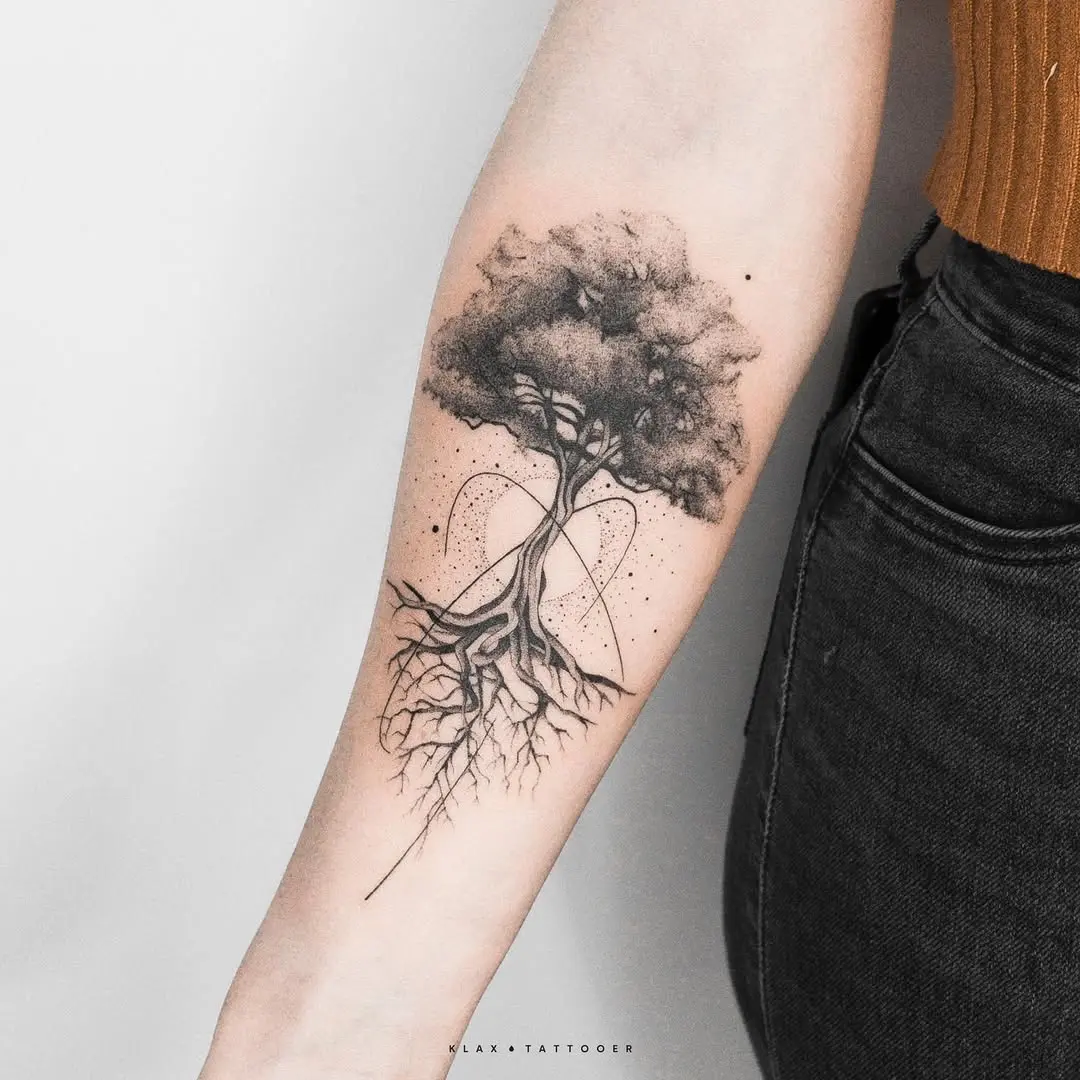 Elegant tree tattoo symbolizing rebirth and connection
