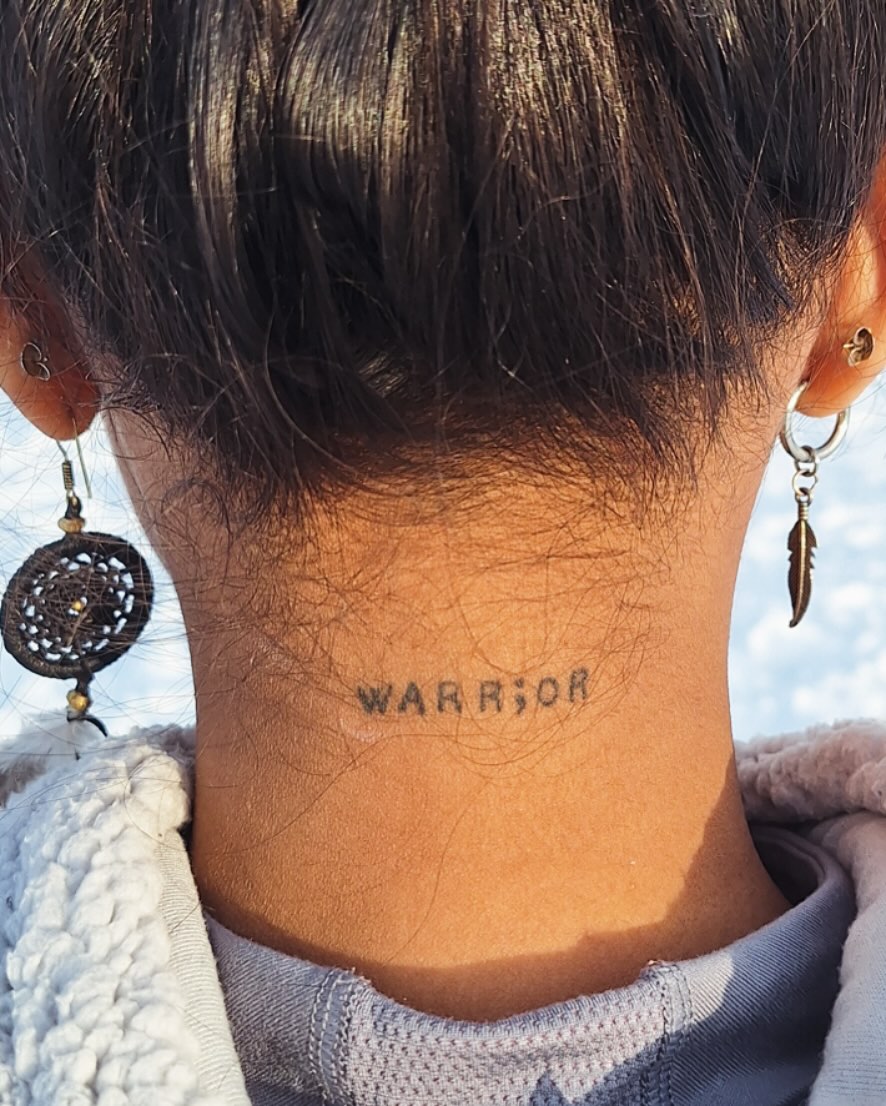 Empowerment symbol in a bold tattoo design