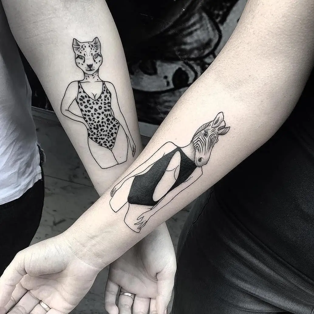 Stylish sibling tattoos with animal themes