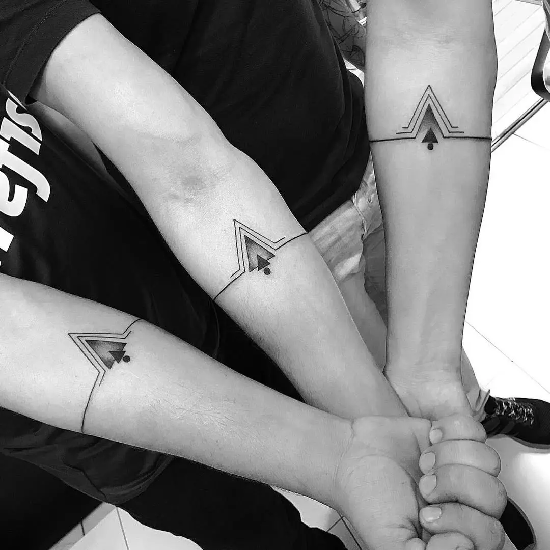 Bold sibling tattoos showcasing unity and style