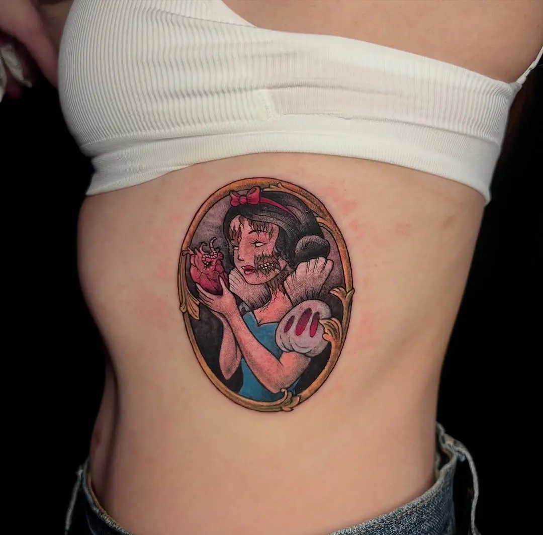Enchanting Snow White Rib Cage Tattoo Design