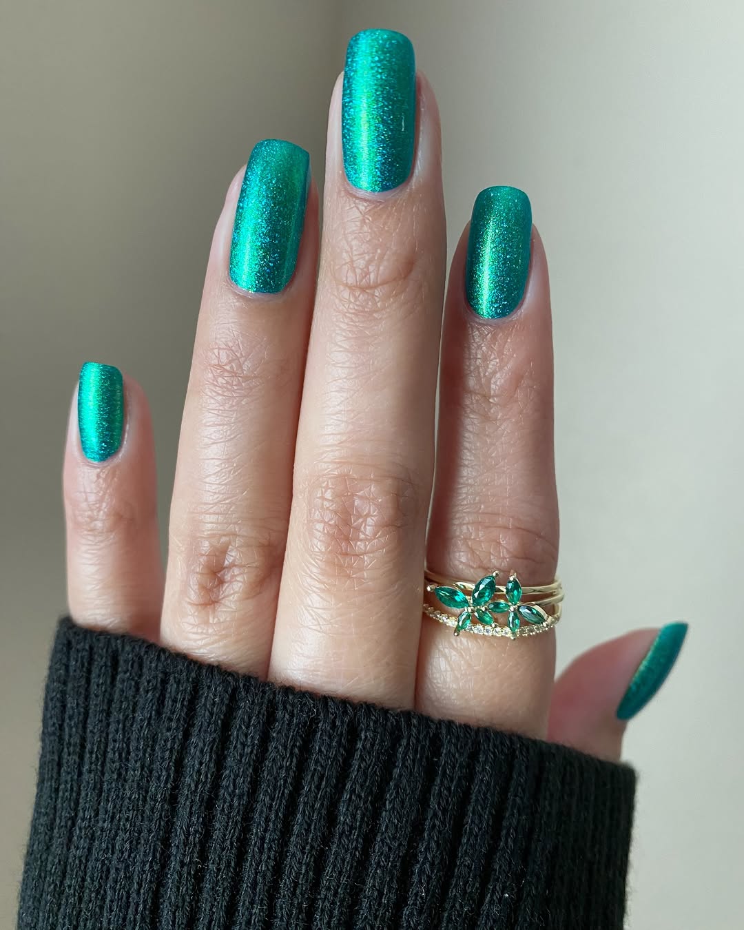 Eye-catching teal nails with stunning shimmer