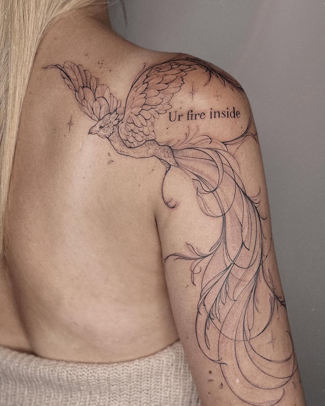 Elegant phoenix tattoo symbolizing inner strength
