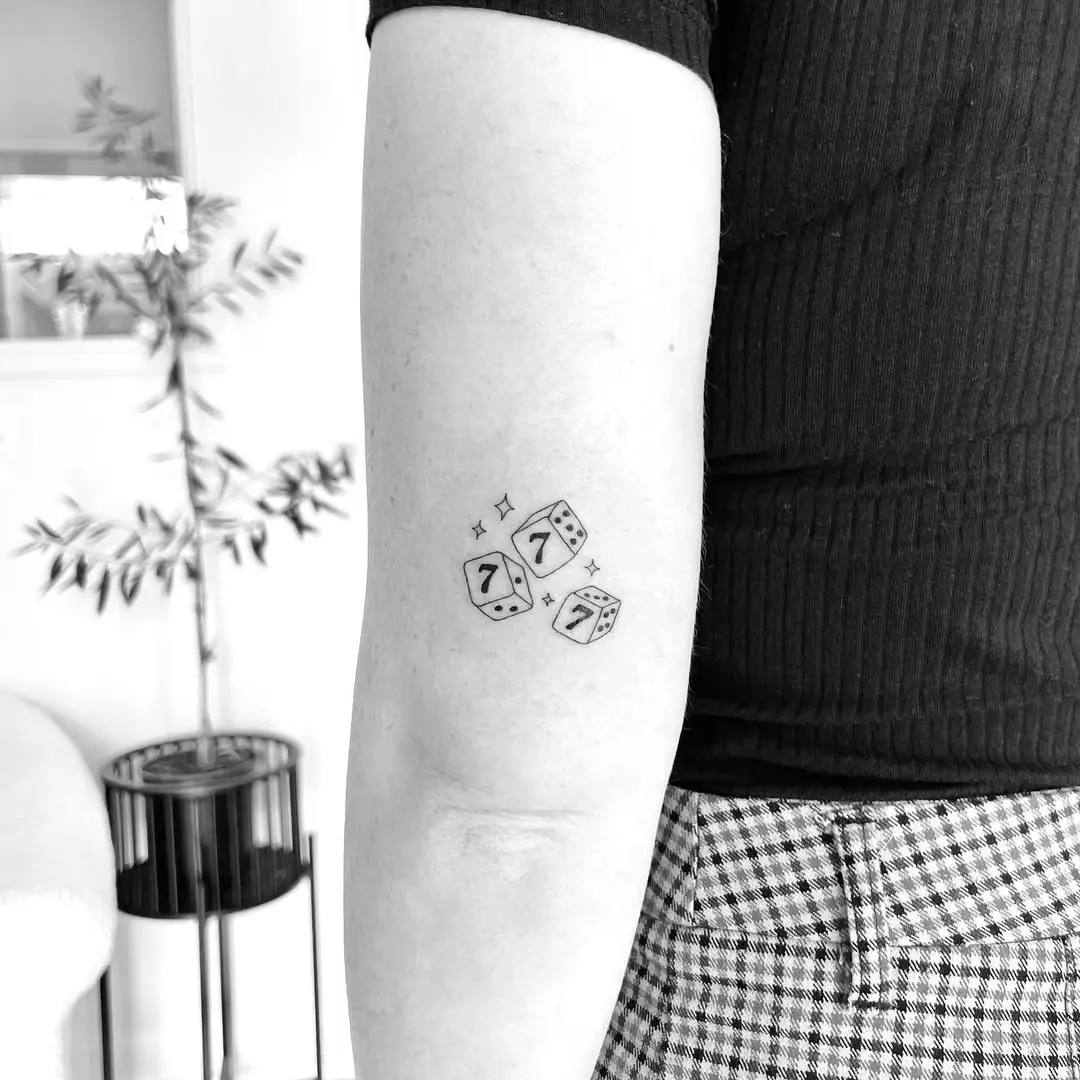 Unique seven dice tattoo for luck and charm