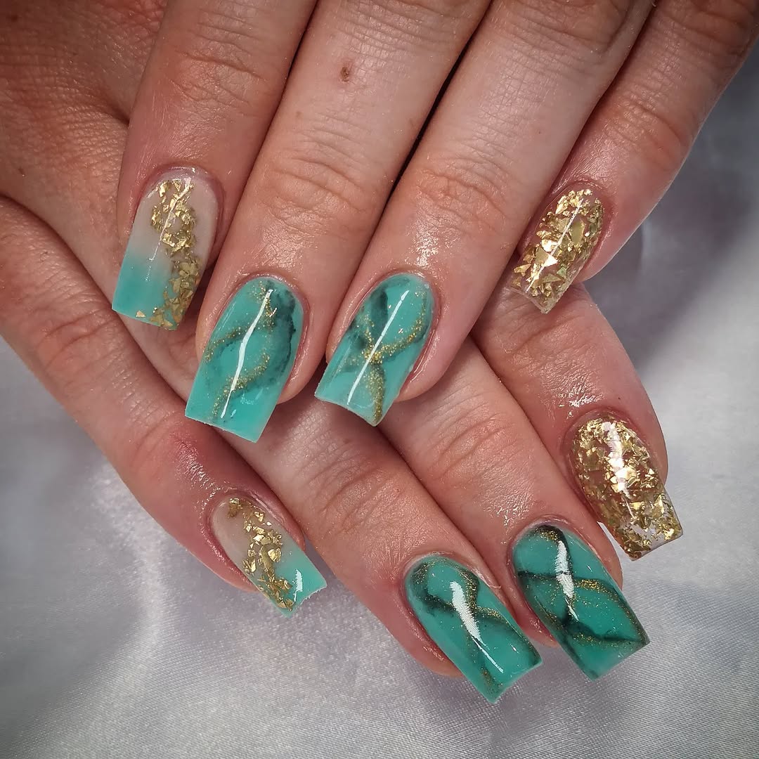 Stunning teal nails with gold flecks