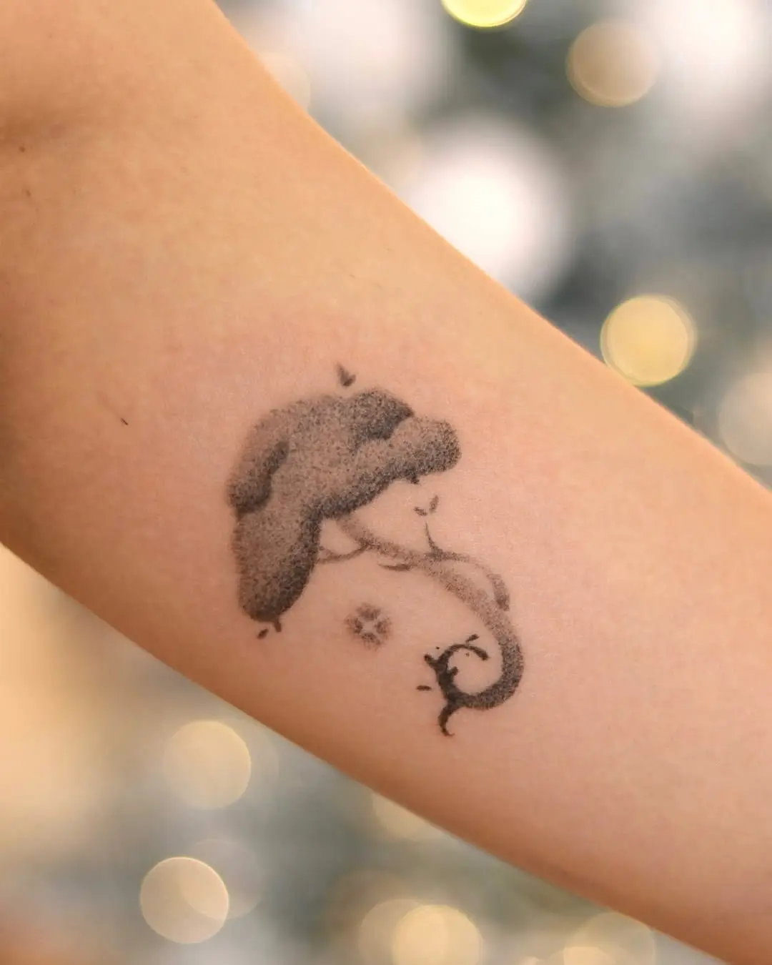 Elegant minimalist tree tattoo design captured beautifully