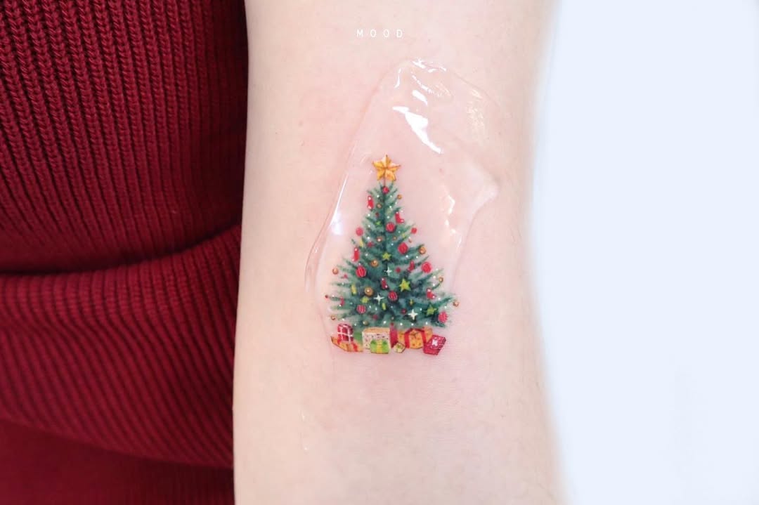 Festive Christmas Tree Tattoo with Gifts Galore