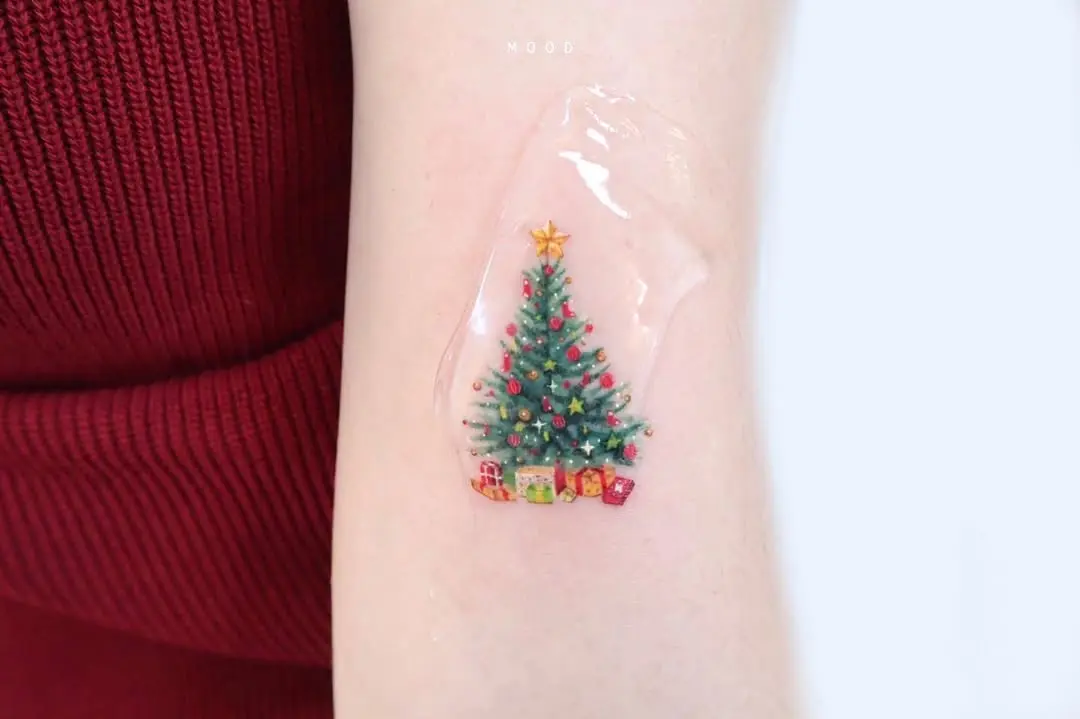 Festive Christmas Tree Tattoo with Gifts Galore