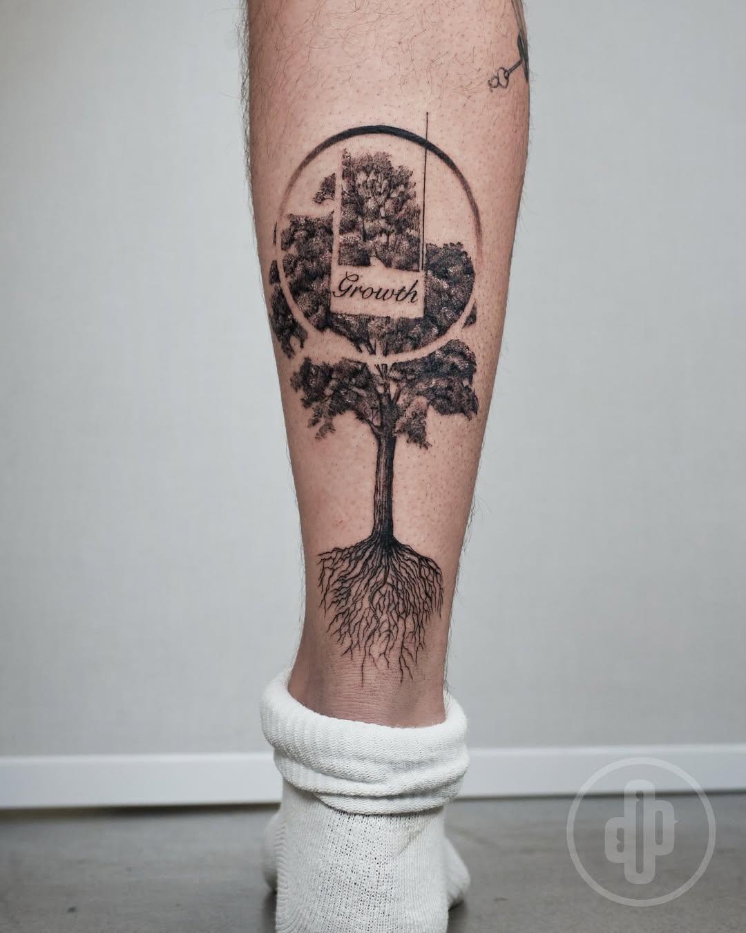 Symbolic Tree Tattoo Emphasizing Growth