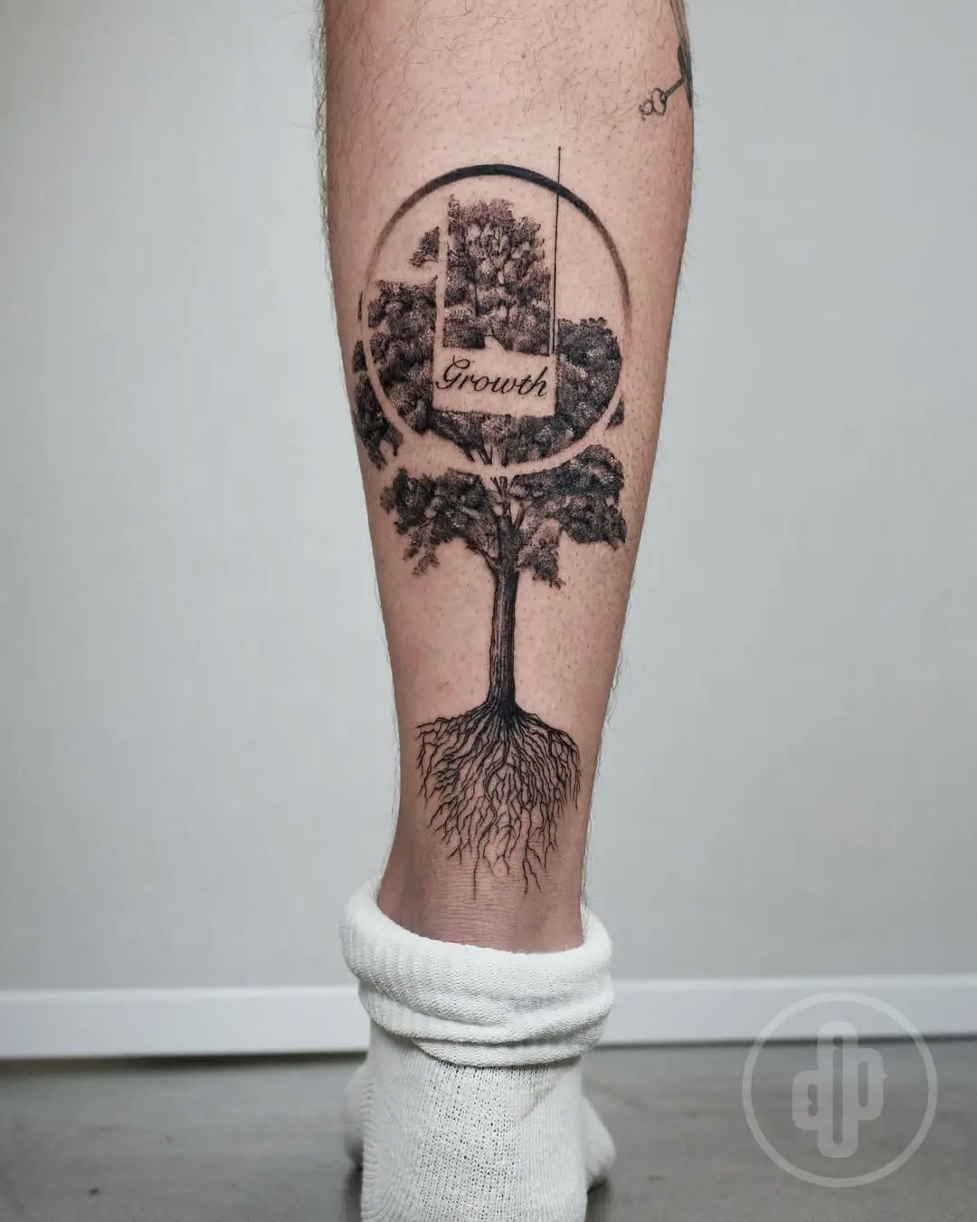 Symbolic Tree Tattoo Emphasizing Growth