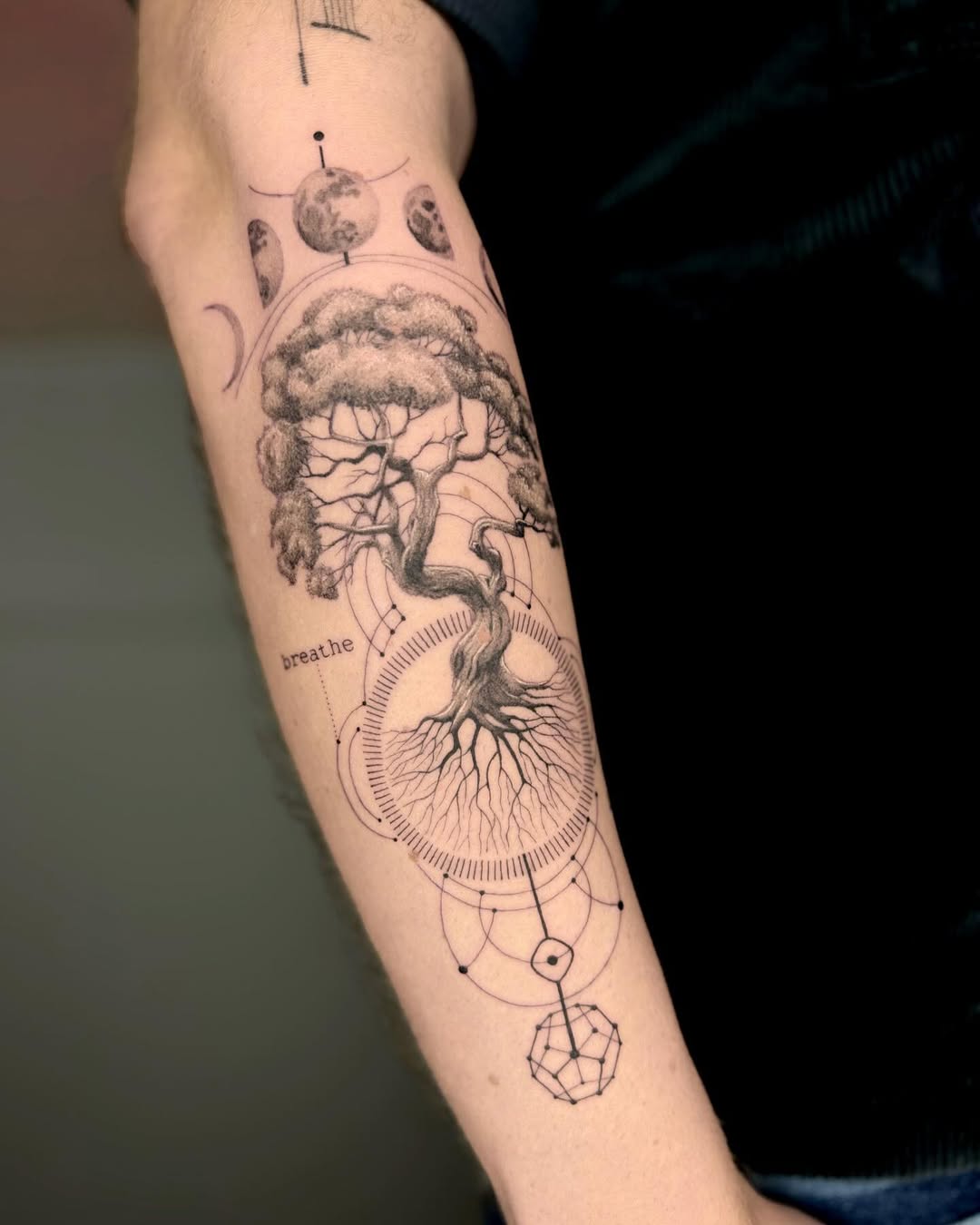 Nature-inspired tattoo with geometric elements