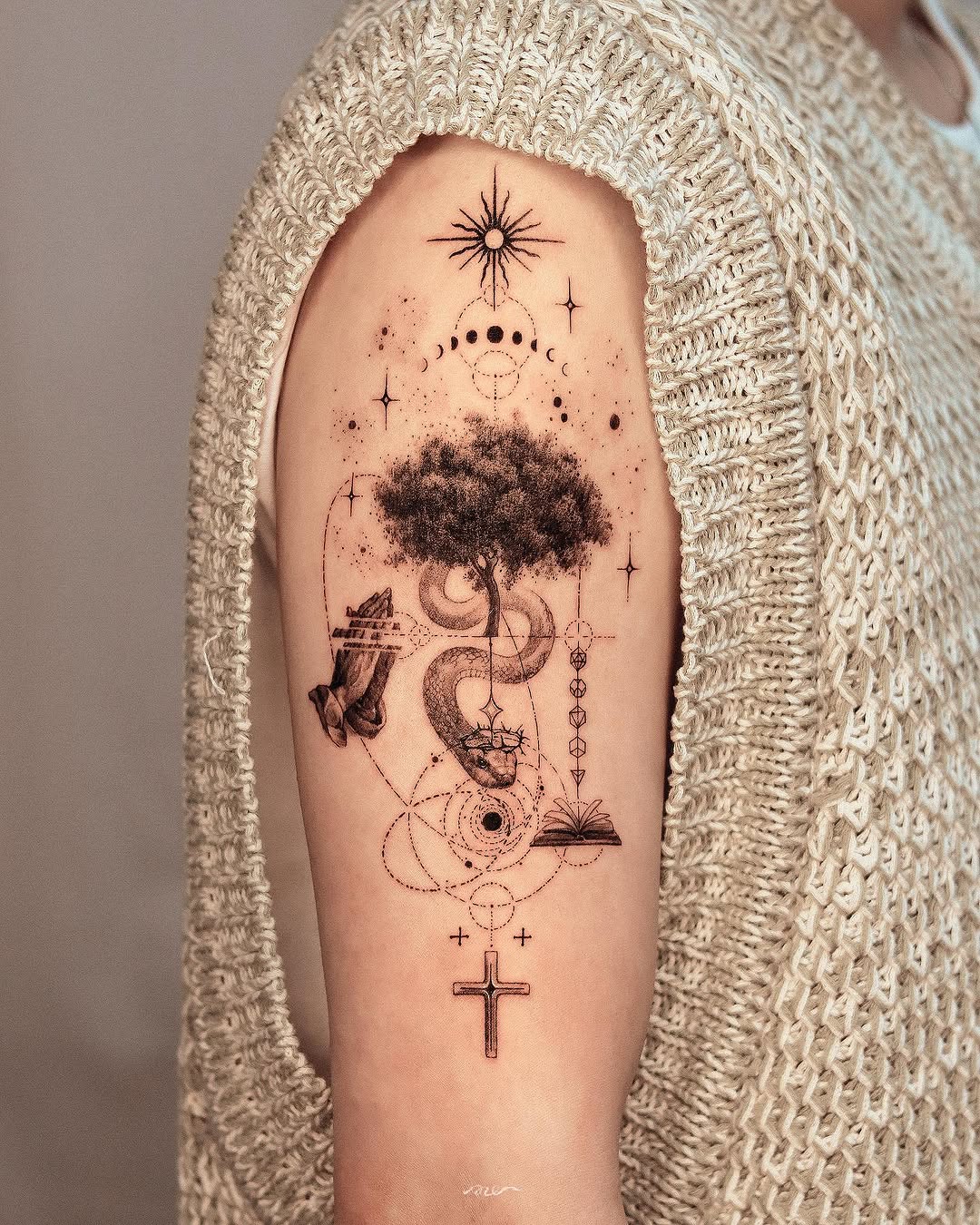 Unique tree tattoo with cosmic elements and snake