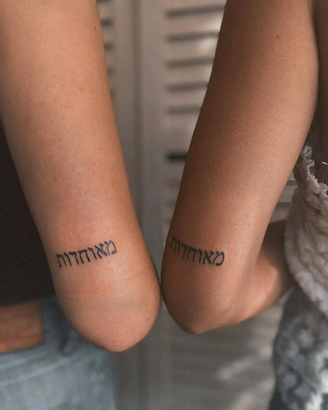 Meaningful Hebrew twin tattoo designs reveal bond